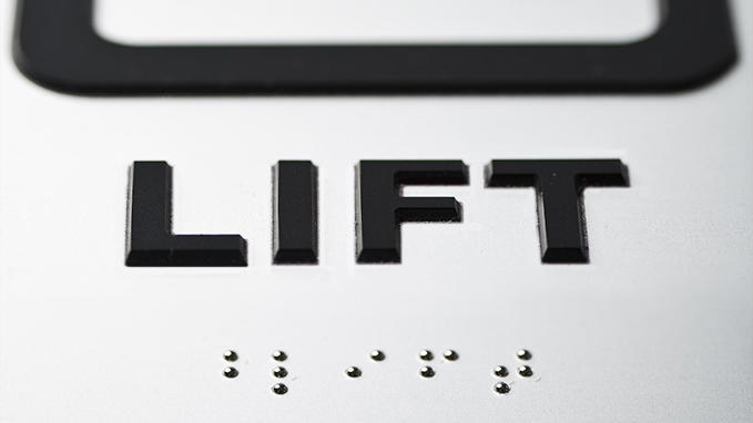 Braille and relief indoor signage with over 70% contrast in Gravotac™