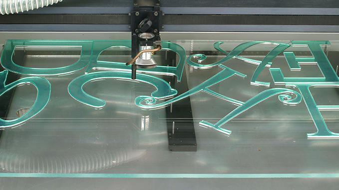 Cutting of lettering in acrylic with Gravotech laser