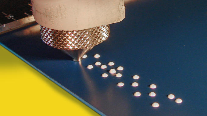 Insertion of acrylic beads to form a text in Braille