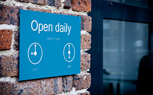 Engraving and cutting for directional signs and badges