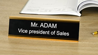 Sign holders and nameplates