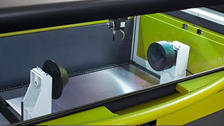 Cylindrical attachment for a laser machine