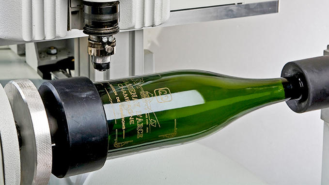 Engraving on glass for flasks and bottles