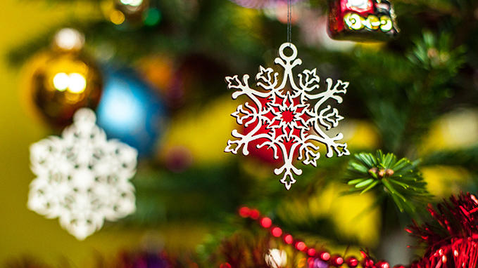 Laser cutting of wood for creating traditional Christmas decorations