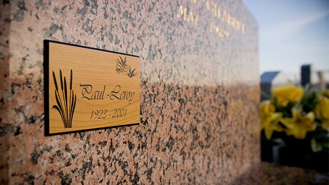 Engraving of wooden plaques for steles and graves