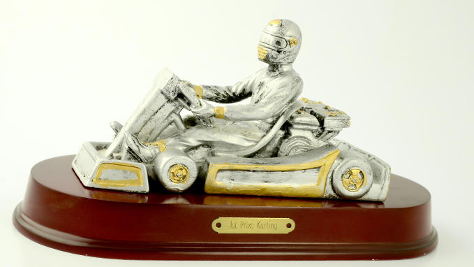 Personalise your trophies with our steel- or gold-look metal plaques