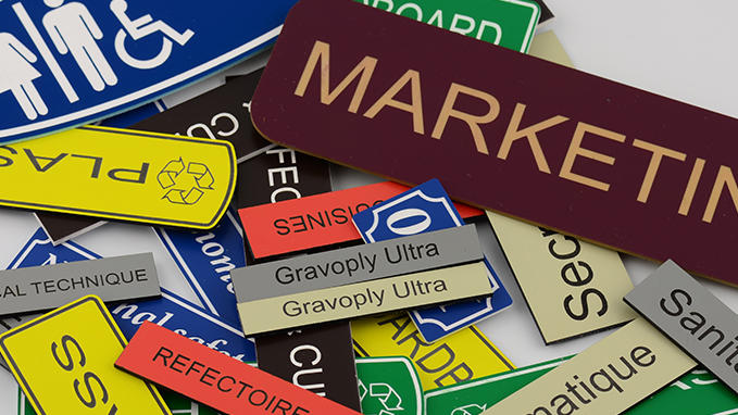 Laser marking of badges and labels