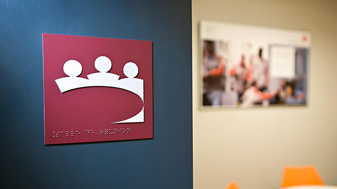 Engraving of information signage plaques in Braille