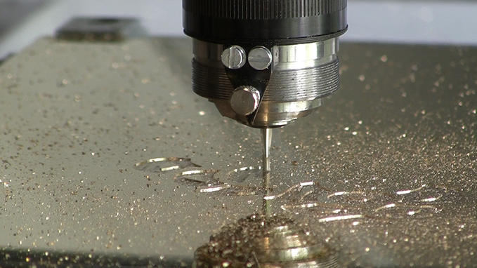 Mechanical engraving of metal plates 