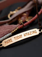 Mechanical engraving of text on a baby identity bracelet